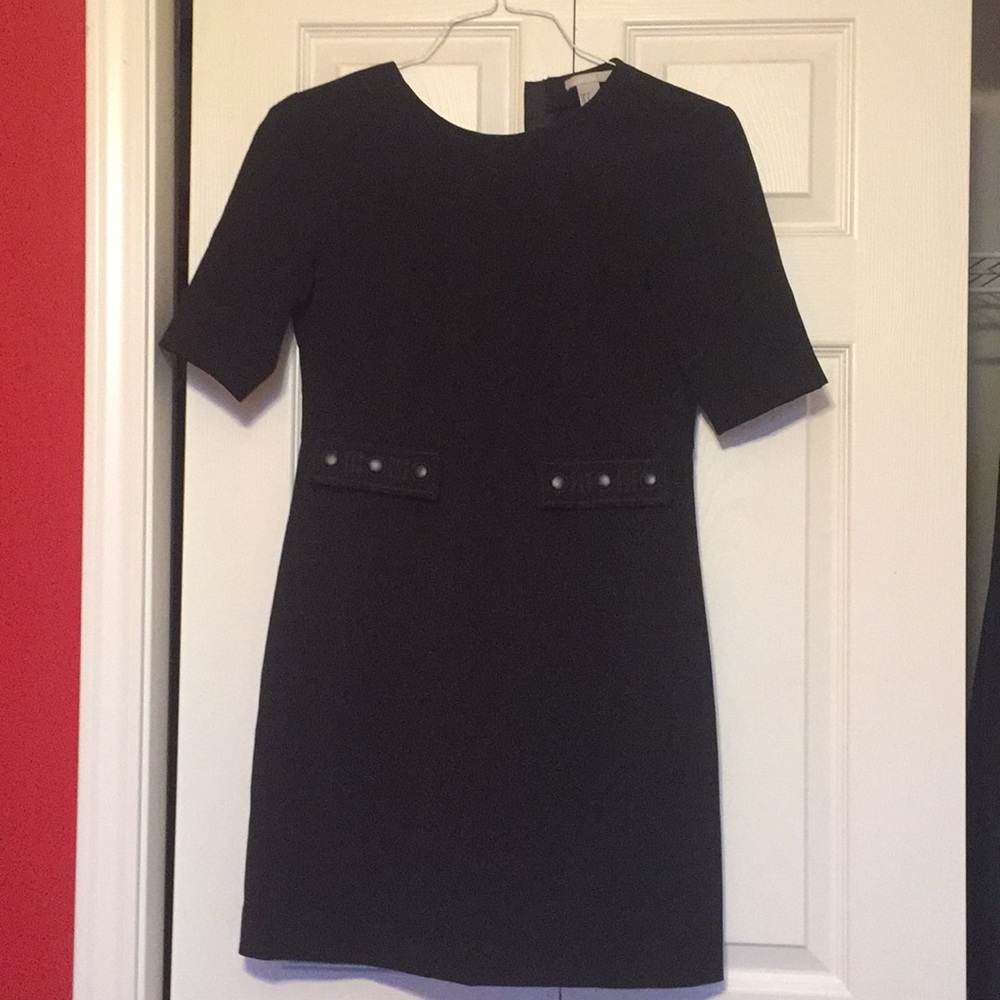 Black H&M dress with zipper on the back. Size 6